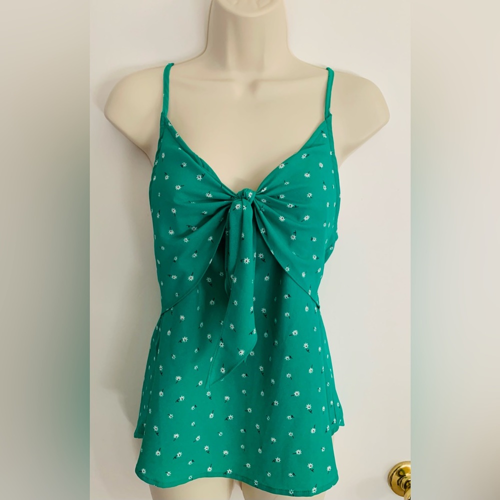E&M silky green blouse with tiny white flowers. Size M, in like new condition.